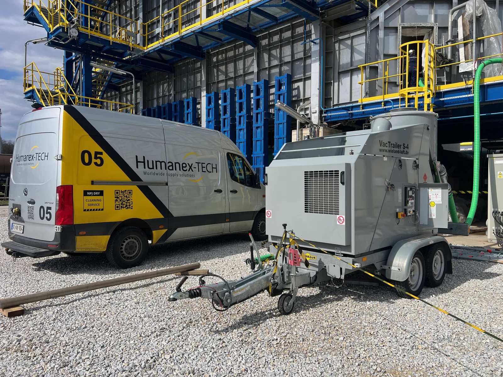 Industrial vacuum pump on site with a Humanex-Tech service vehicle